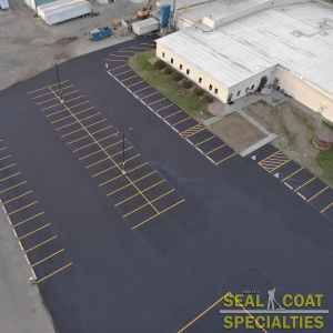 Birdseye view of a sealcoated parking lot