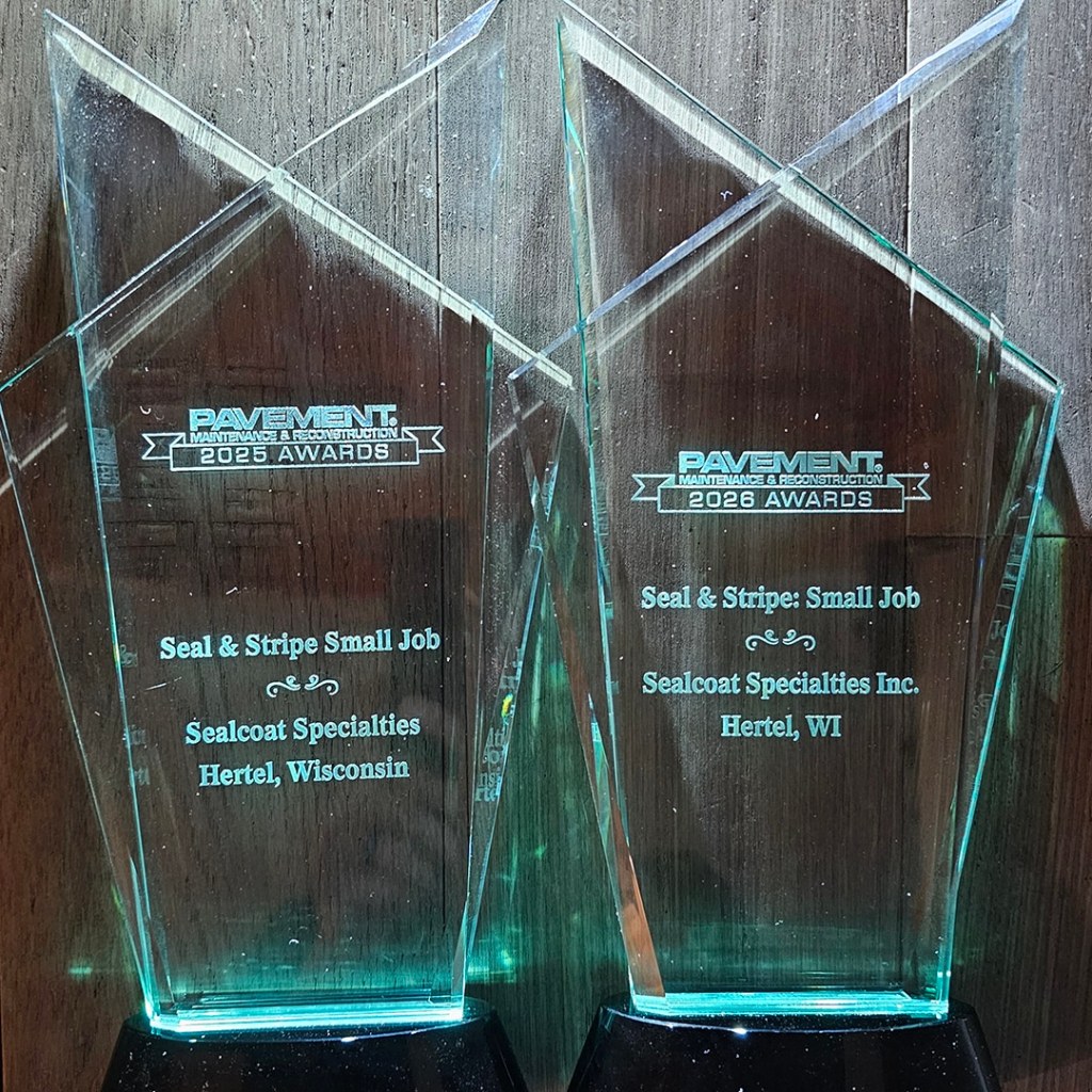 Back-to-back Seal & Stripe Awards earned by Sealcoat Specialties for excellence in pavement maintenance.